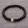 By Gabay, Armbånd med træperler og Guldkors, Ø 18 cm