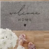 Dørmåtte: Welcome home