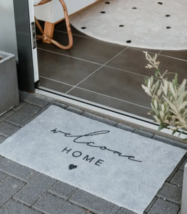 Dørmåtte: Welcome home
