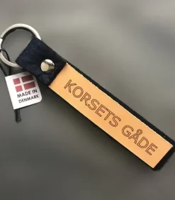 Nøglering, KORSETS GÅDE