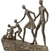 Skulptur Familie med to børn på bakke