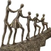 Skulptur Familie med tre børn på bakke